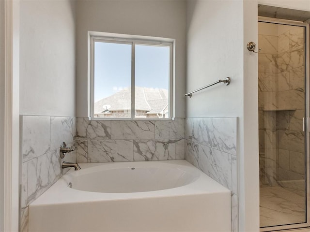 817 Carrie Ct, Purcell, OK 73080 - bathroom with a stall shower and a garden tub