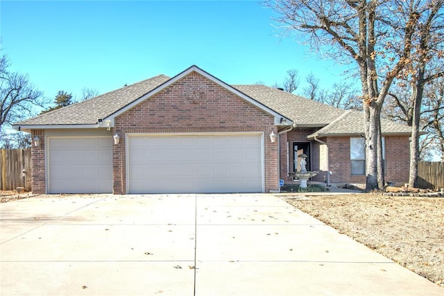 ranch-style house featuring a garage