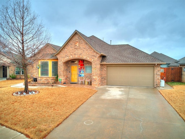 view of front of property with a garage