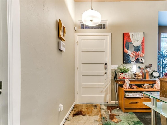 doorway with concrete floors