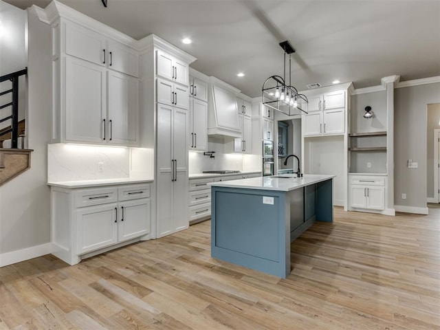 3134 NW 37th St, Newcastle, OK 73065 - kitchen with a sink, white cabinetry, light countertops, gas stovetop, and recessed lighting
