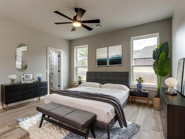 3134 NW 37th St, Newcastle, OK 73065 - bedroom with light wood-style floors and ceiling fan