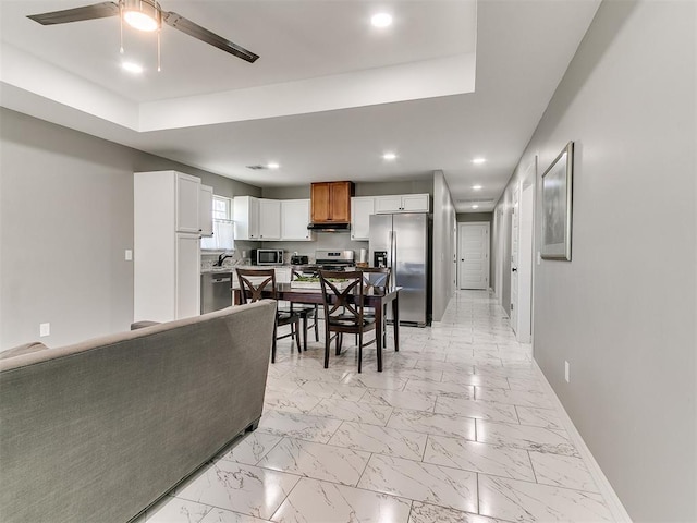 dining area featuring recessed lighting, marble finish floor, ceiling fan, and baseboards