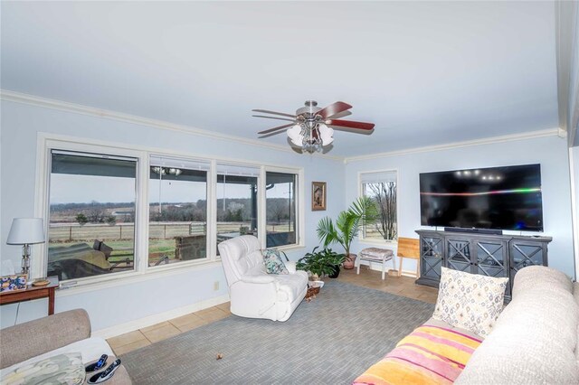 1901 E 15th St, Chandler, OK 74834 - living room featuring a ceiling fan and ornamental molding