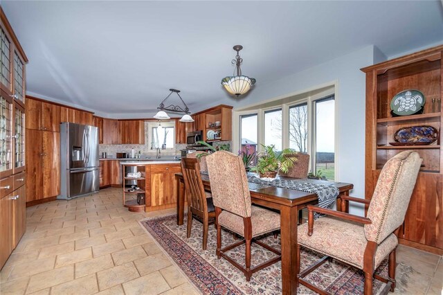 1901 E 15th St, Chandler, OK 74834 - dining room with light stone finish floors