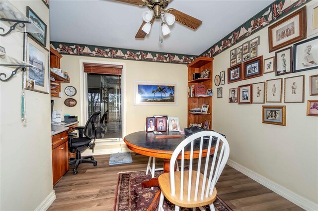 1901 E 15th St, Chandler, OK 74834 - office featuring ceiling fan, light wood-style flooring, and baseboards
