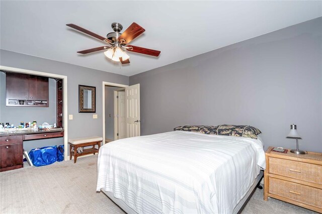 1901 E 15th St, Chandler, OK 74834 - bedroom featuring light carpet and ceiling fan
