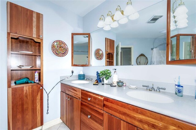 1901 E 15th St, Chandler, OK 74834 - full bath with double vanity and tile patterned floors