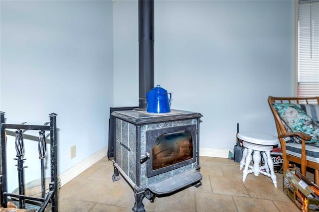 1901 E 15th St, Chandler, OK 74834 - detailed view of a wood stove and baseboards