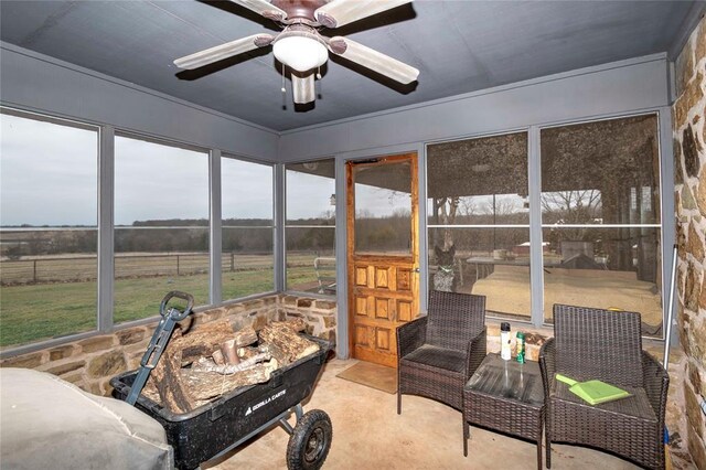 1901 E 15th St, Chandler, OK 74834 - sunroom featuring a ceiling fan and a view of rural / pastoral area