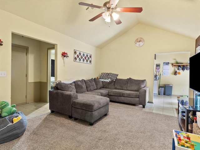 living room featuring light carpet, lofted ceiling, and ceiling fan