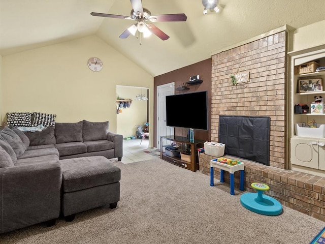 carpeted living room with ceiling fan, vaulted ceiling, and a brick fireplace