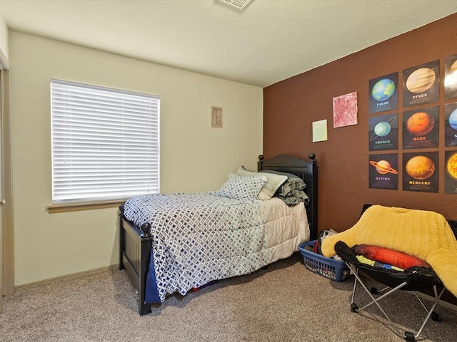 bedroom featuring carpet flooring