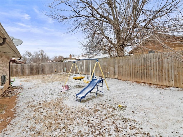 view of snow covered playground