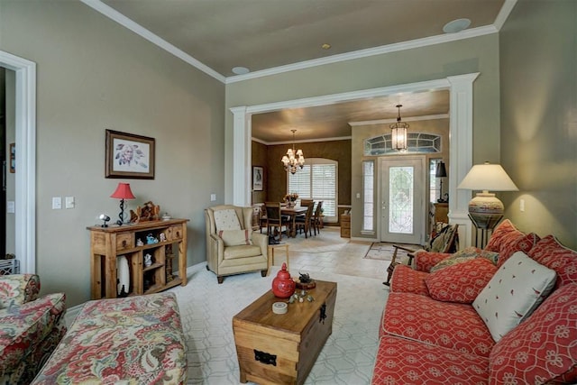 living room with light colored carpet, ornamental molding, and a chandelier