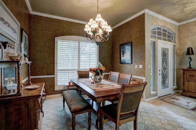 dining space with an inviting chandelier and ornamental molding