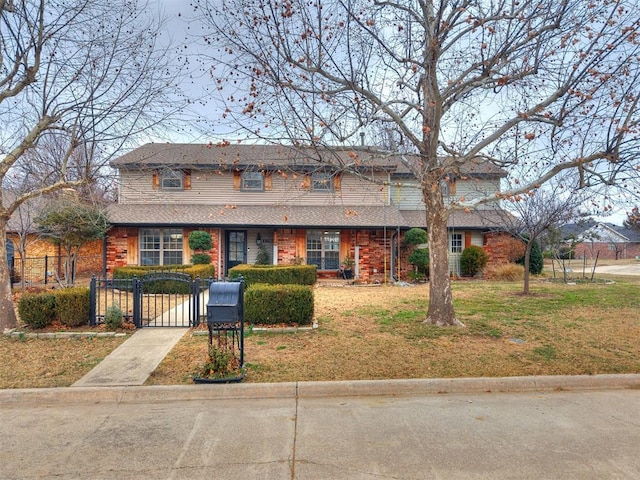 view of front facade with a front yard