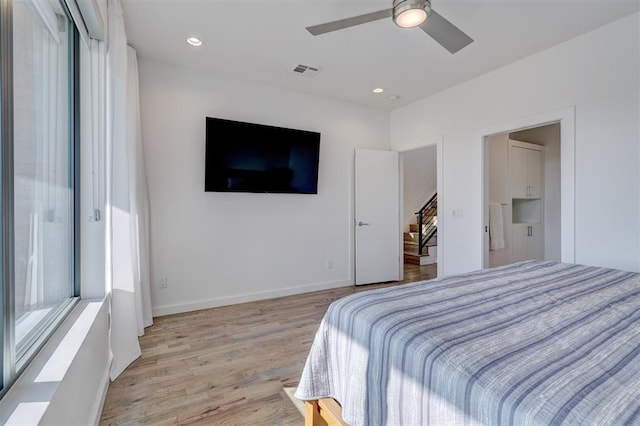 841 NW 6th St, Oklahoma City, OK 73106 - bedroom featuring light wood finished floors, a ceiling fan, baseboards, and recessed lighting