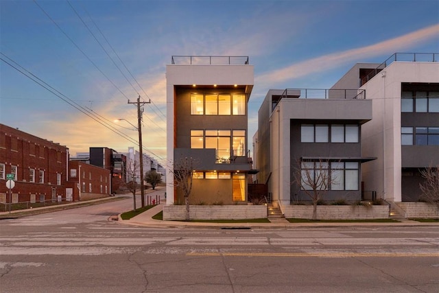 contemporary home with stucco siding