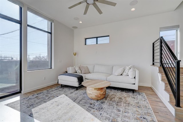 841 NW 6th St, Oklahoma City, OK 73106 - living room with light wood-style floors, ceiling fan, baseboards, and recessed lighting