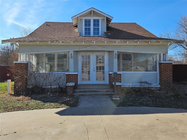 view of front facade featuring french doors