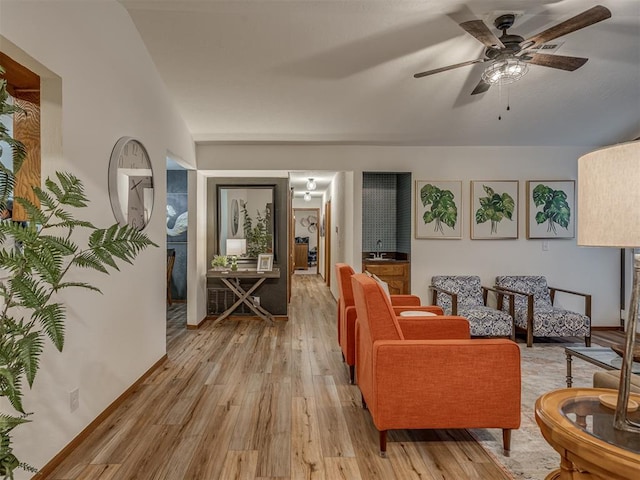 2108 Barton St Unit 2110, Norman, OK 73072 - living area featuring light wood-style flooring and ceiling fan