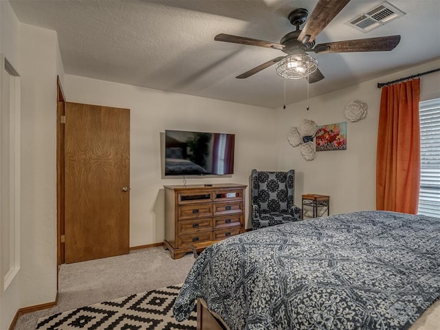 2108 Barton St Unit 2110, Norman, OK 73072 - carpeted bedroom with visible vents, baseboards, and a ceiling fan