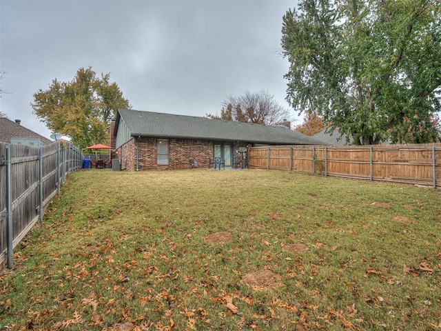 2108 Barton St Unit 2110, Norman, OK 73072 - view of yard with a fenced backyard