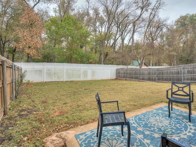 2108 Barton St Unit 2110, Norman, OK 73072 - view of yard with a patio area and a fenced backyard