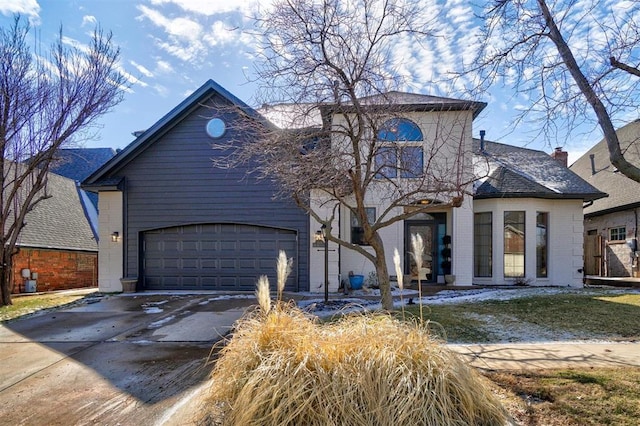 view of front of property with a garage