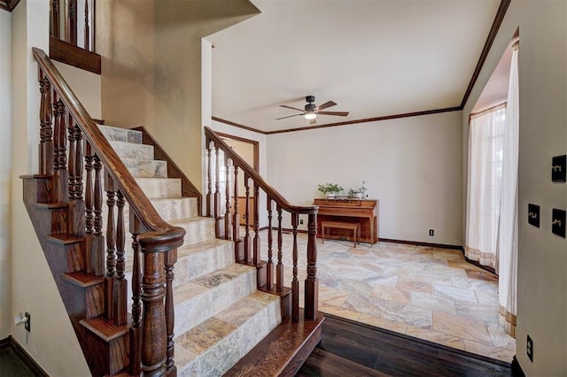 staircase with hardwood / wood-style flooring, ceiling fan, and ornamental molding