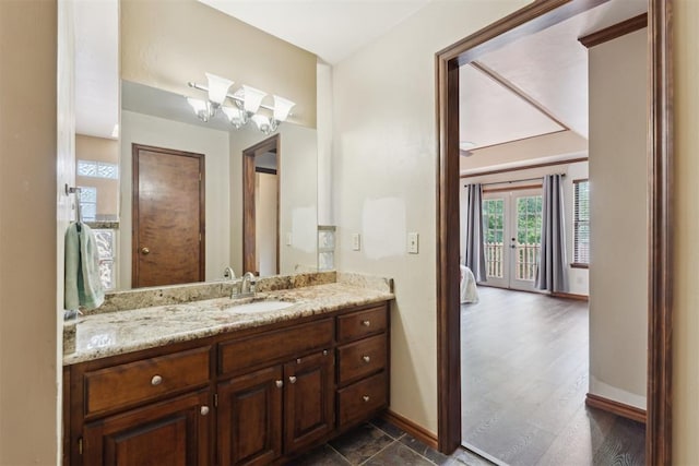1408 NW 147th St, Edmond, OK 73013 - bathroom with vanity and french doors