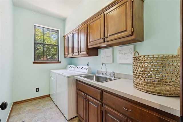 1408 NW 147th St, Edmond, OK 73013 - washroom featuring washer and clothes dryer and cabinet space