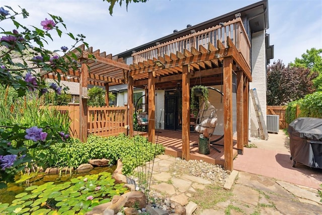 1408 NW 147th St, Edmond, OK 73013 - view of patio featuring a pergola and a wooden deck