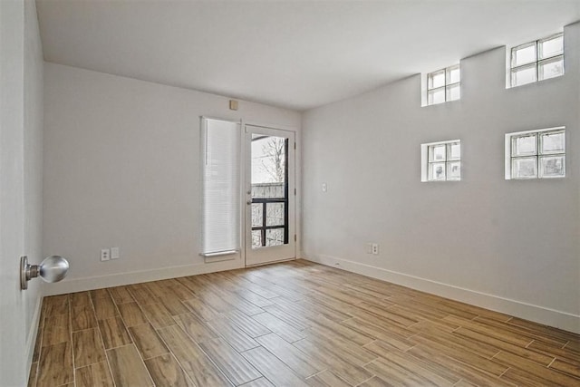 spare room featuring a wealth of natural light