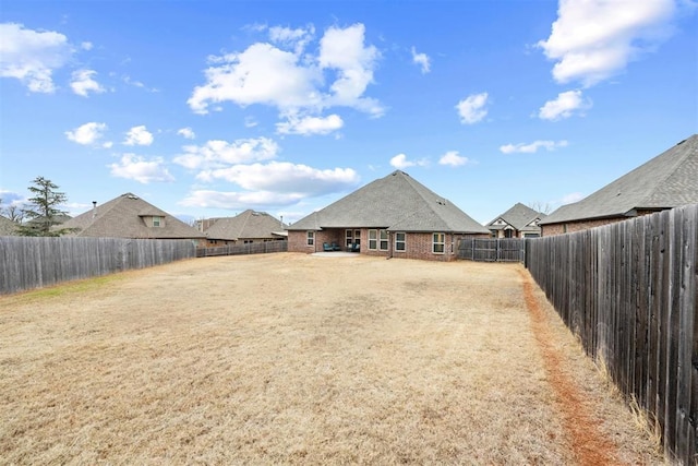 view of yard featuring a fenced backyard