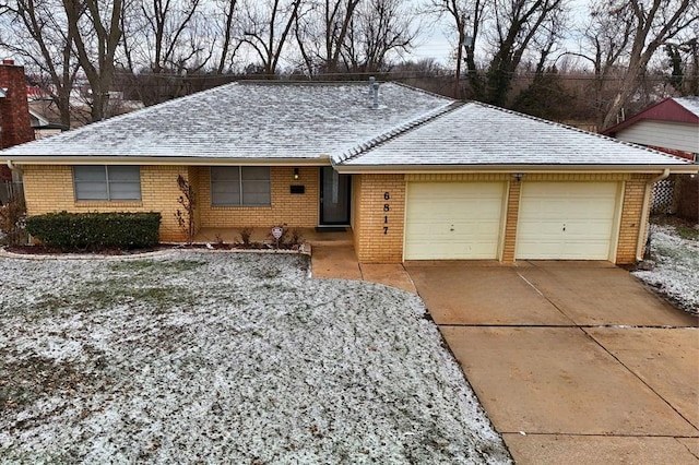 single story home with a garage