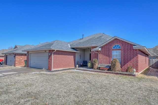 ranch-style house featuring a garage