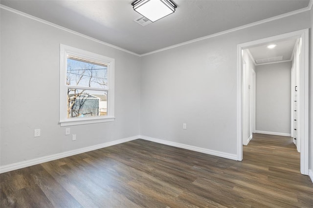 unfurnished room featuring ornamental molding and dark hardwood / wood-style flooring