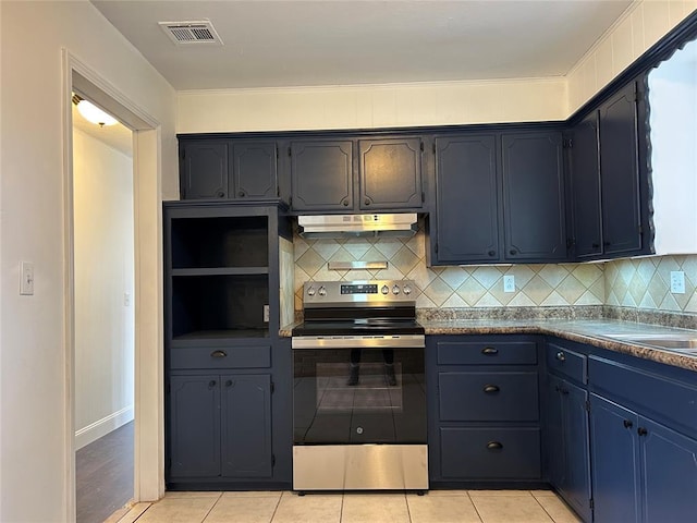 kitchen with tasteful backsplash, stainless steel electric stove, and light tile patterned floors