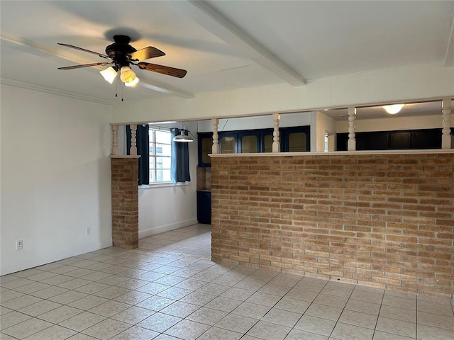 unfurnished room featuring beamed ceiling, brick wall, light tile patterned floors, and ceiling fan