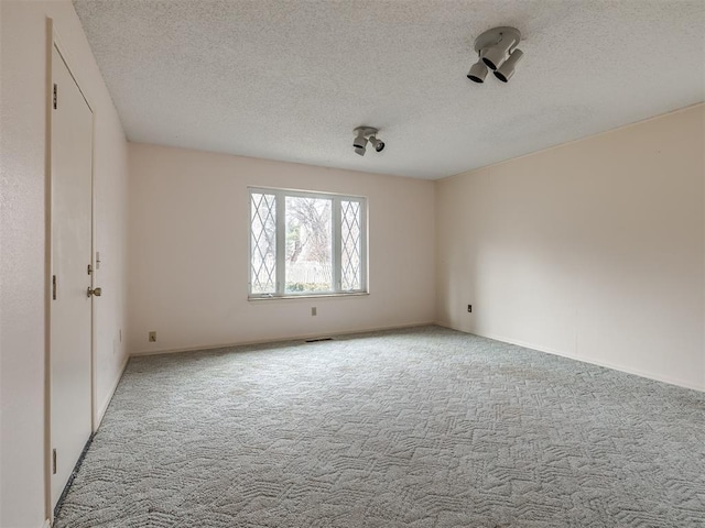 interior space featuring a textured ceiling