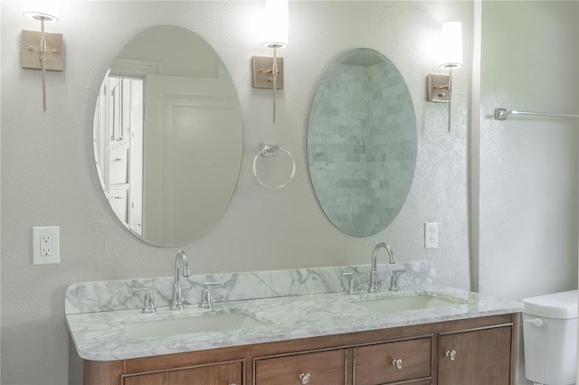 3125 NW 24th St, Oklahoma City, OK 73107 - full bathroom with toilet and double vanity
