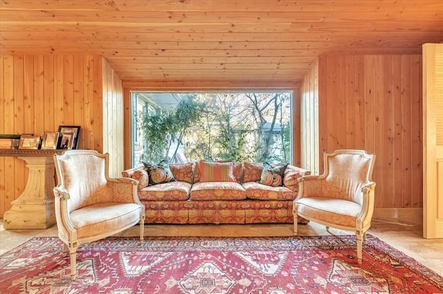 living room with wooden ceiling and wood walls