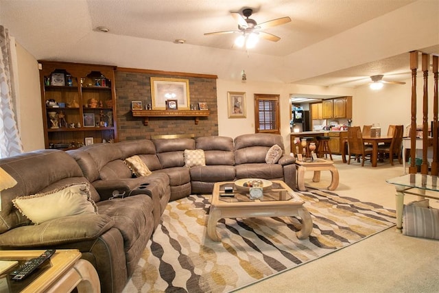 living room featuring light carpet and ceiling fan