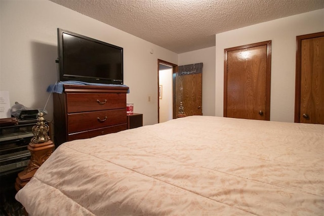 bedroom with a textured ceiling