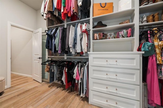 walk in closet featuring light wood-type flooring