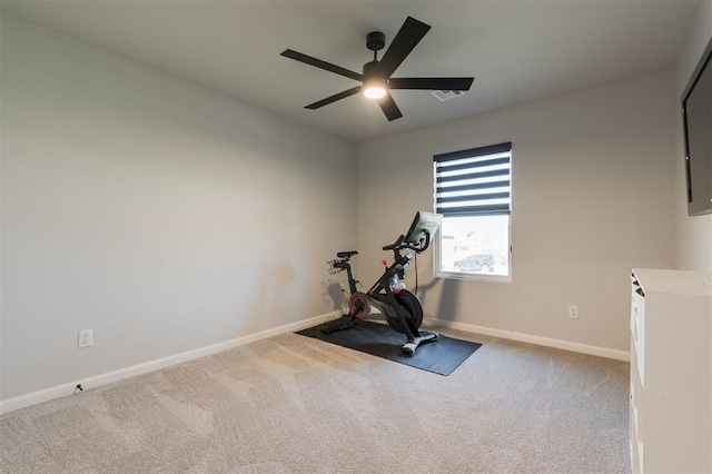 workout area with carpet and ceiling fan