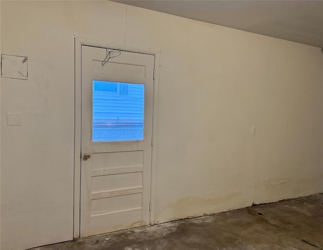 interior space featuring concrete floors