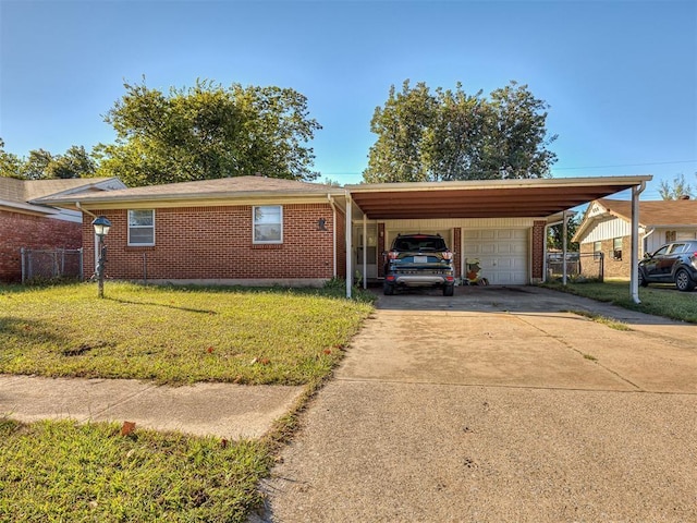 ranch-style house with a garage and a front lawn